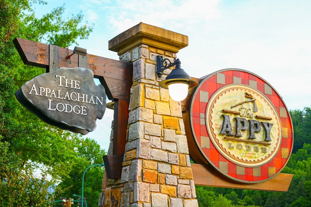 The Appy Lodge sign sunset
